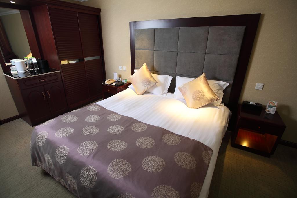 Qingdao Sanfod Hotel Pokoj fotografie