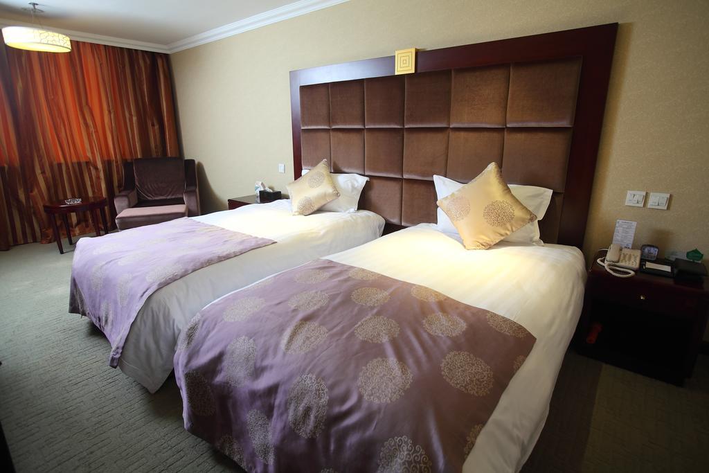Qingdao Sanfod Hotel Pokoj fotografie