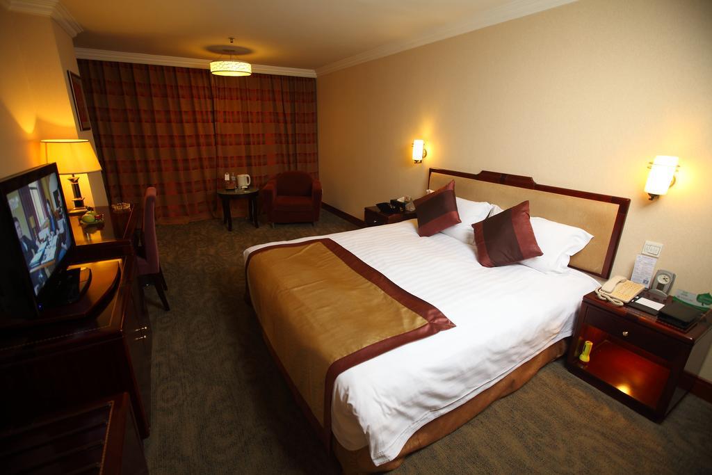Qingdao Sanfod Hotel Pokoj fotografie