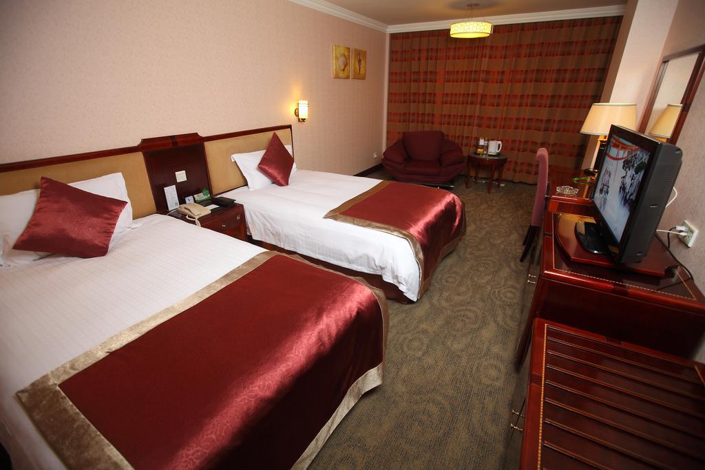 Qingdao Sanfod Hotel Pokoj fotografie